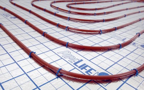 Floorthem Rolle verlegt mit Rohren